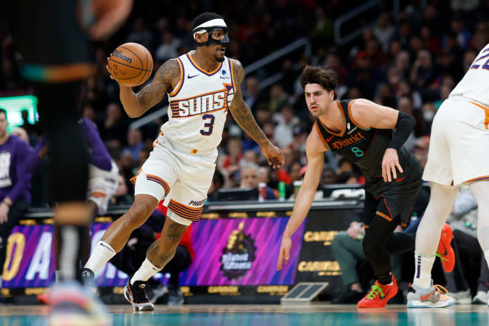 Phoenix Suns guard Bradley Beal (3) drives to the basket past Washington Wizards forward Deni Avdija (8) in the first half at Capital One Arena.